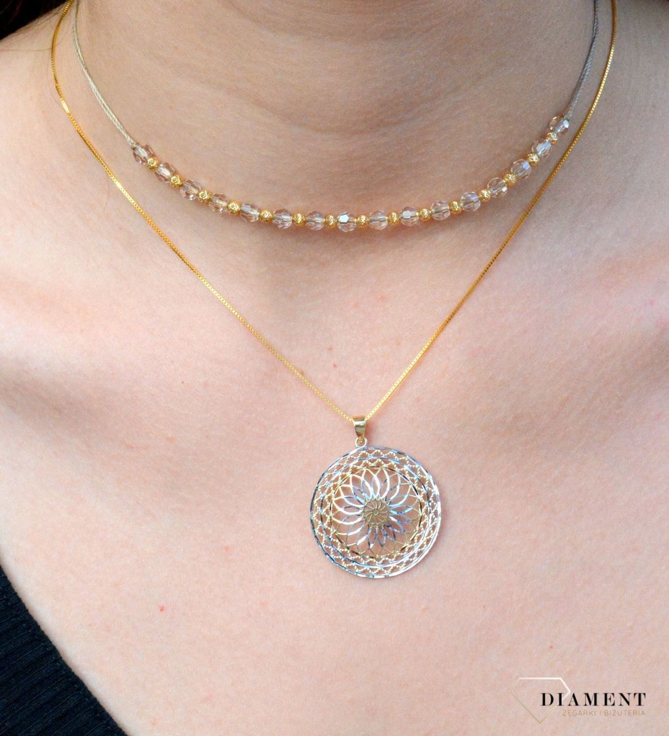 Złota, ażurowa zawieszka pr333 kwiatek ZA 5282 333. Wisiorek na łańcuszek w klasycznym, ponadczasowym ażurowym wzorze wykonany z dwukolorowego złota. Dodatkowo białe złoto delikatnie połyskuje..jpg